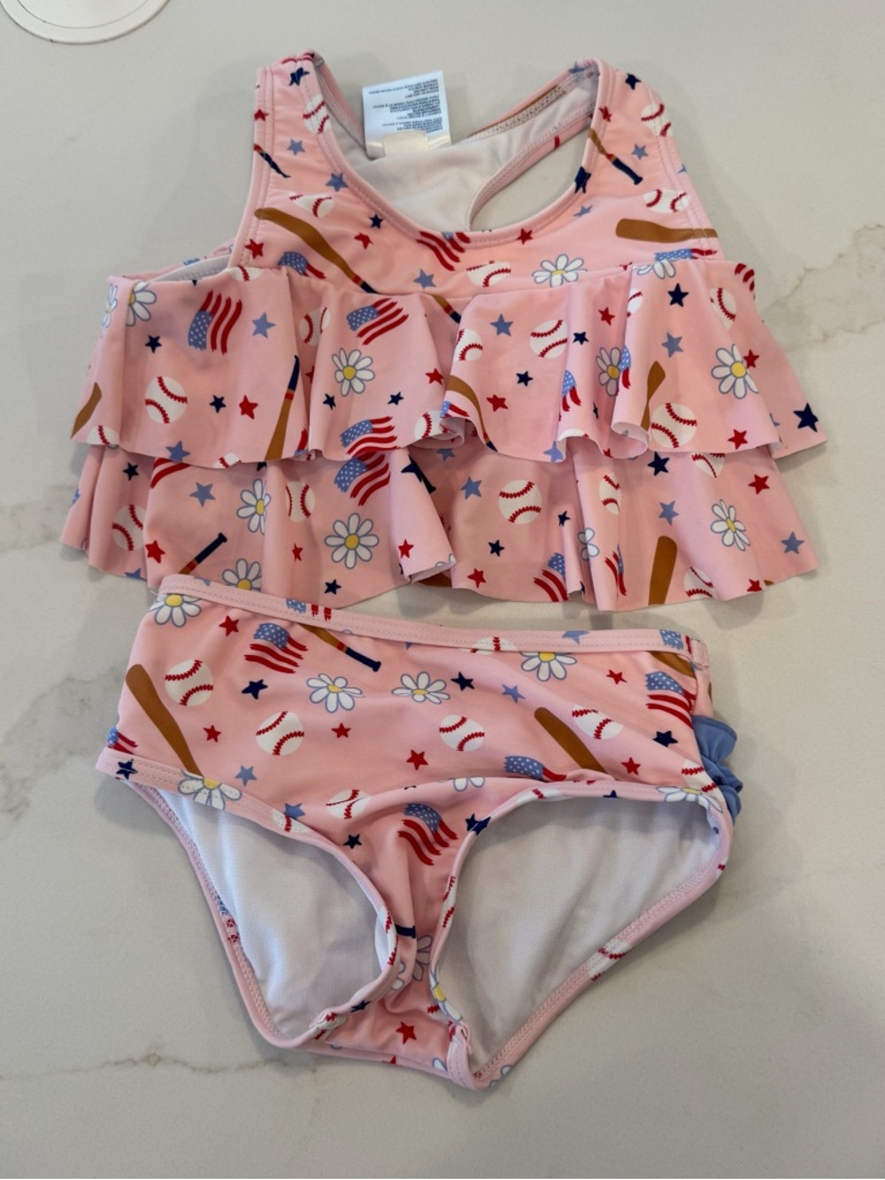 RuffleButts Pink and White Ruffle Tankini Set with Playful Print